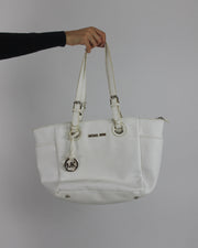 white tote bag with gold-tone hardware front view