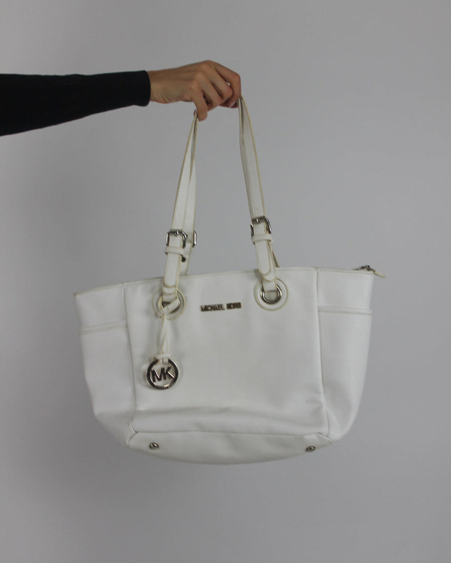 white tote bag with gold-tone hardware front view