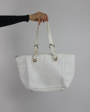 white tote bag with gold-tone hardware back view