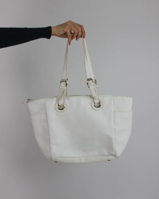 white tote bag with gold-tone hardware back view