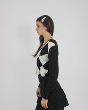 black and white argyle v-neck jumper detail view 02