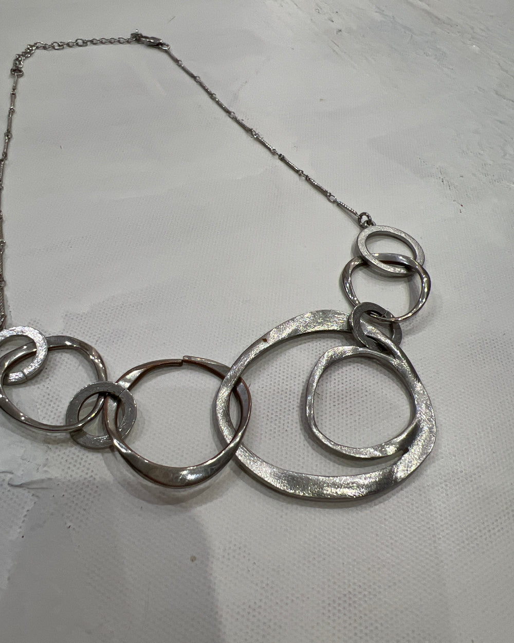gossip girl drop | one size silver-tone layered circle necklace