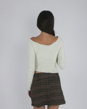 gossip girl drop | small cream lace-up fuzzy top with ribbon detail