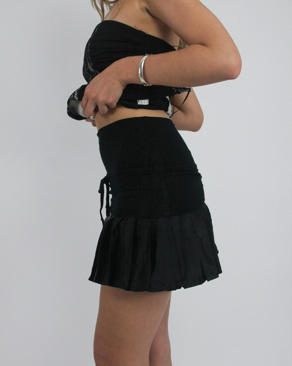 gossip girl drop | small black ruffle mini skirt
