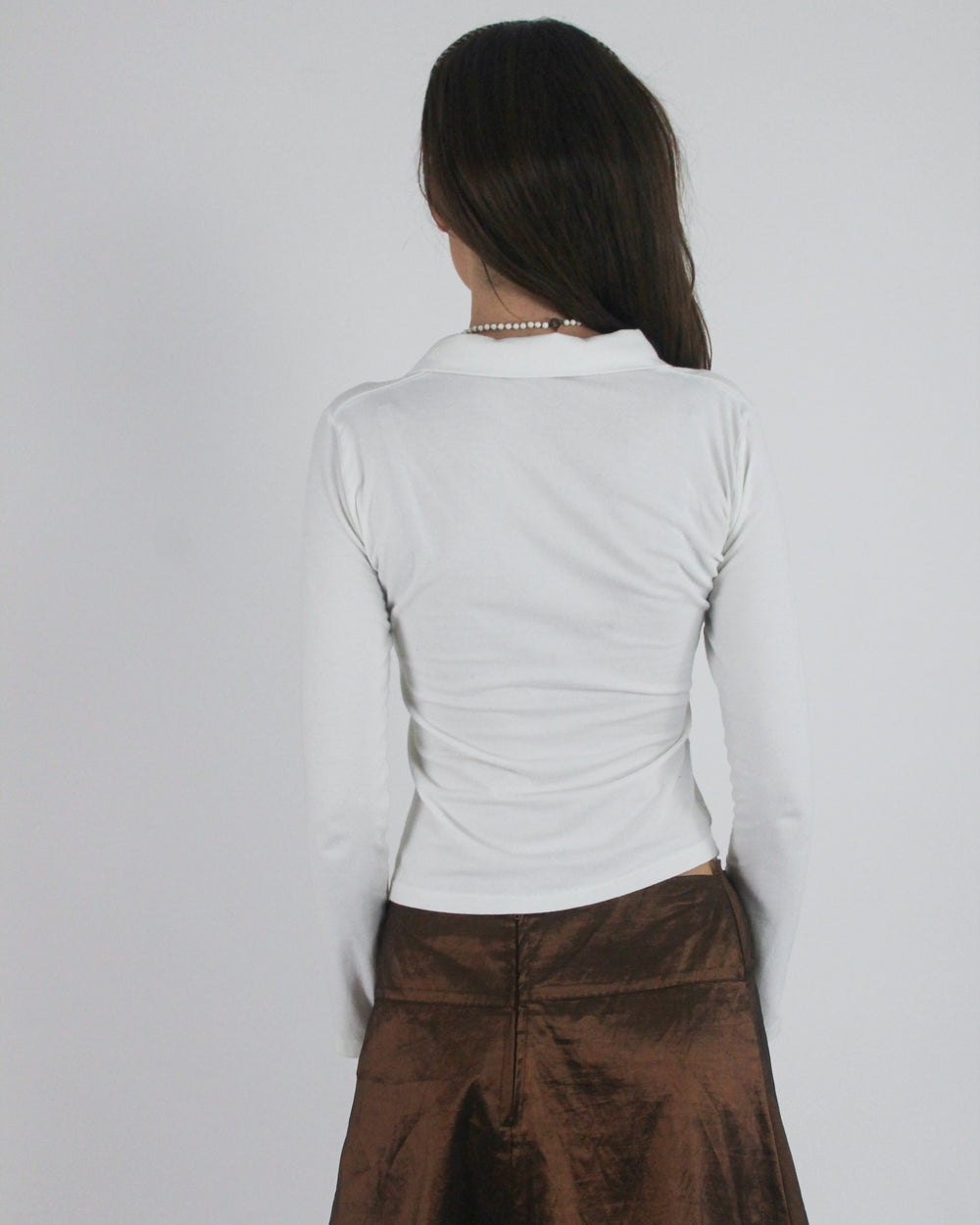 gossip girl drop | medium white collared v-neck long-sleeve top