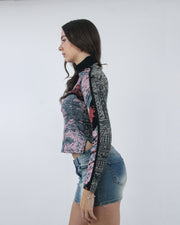 small pink and black abstract print long sleeve top, opposite side view