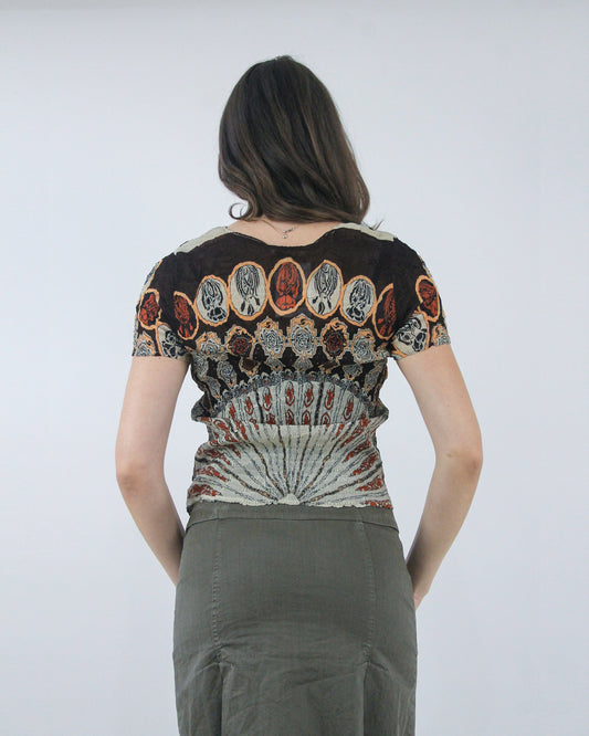 black and brown ornate print short sleeve top, back view