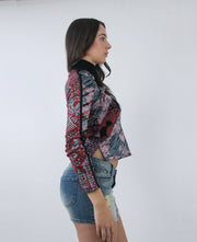 pink and black abstract print long sleeve top, side view
