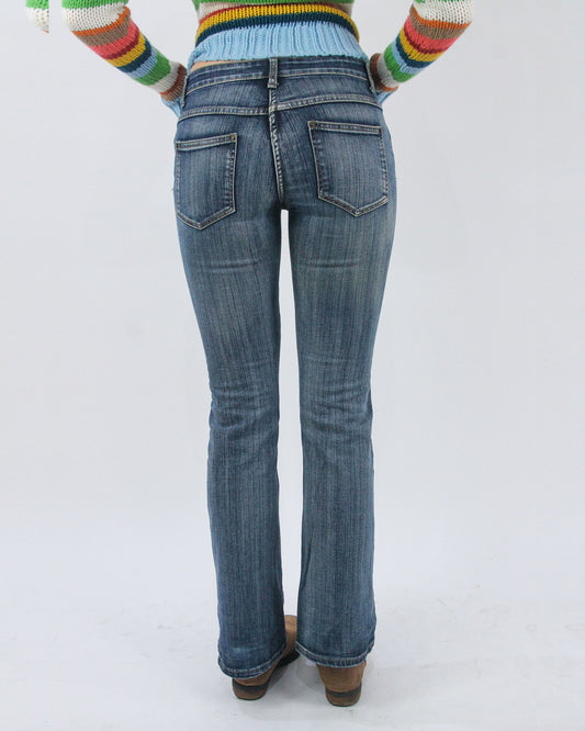 mid blue low rise bootcut jeans, back view