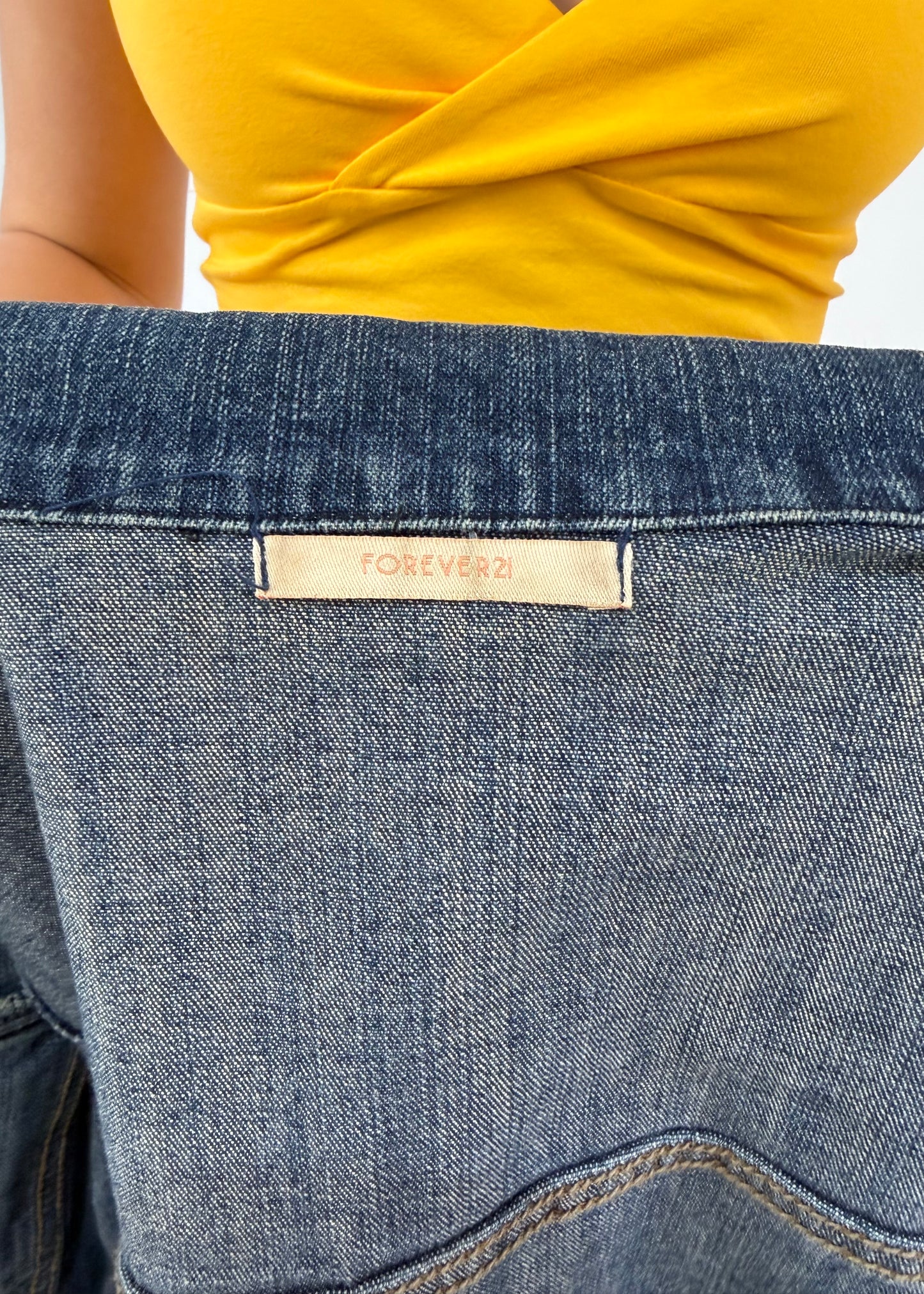 small dark blue forever 21 denim jacket label