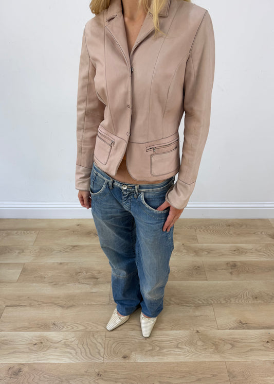 small tan fitted pocket jacket aesthetic close