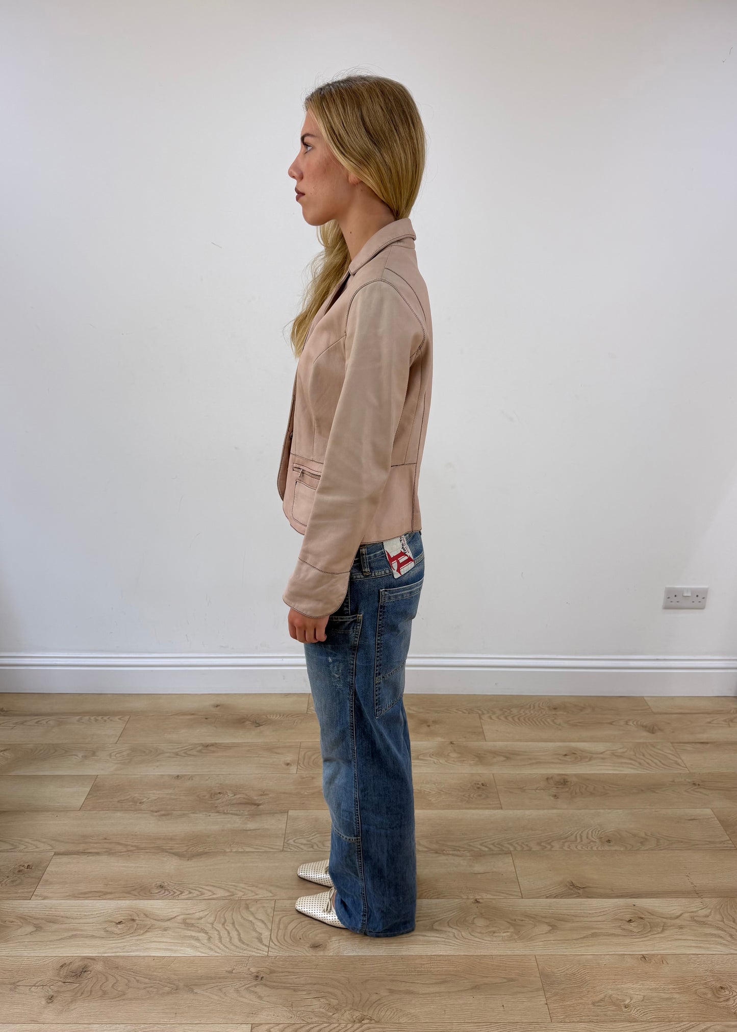small tan fitted pocket jacket left side