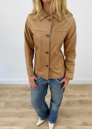 small tan leather fitted jacket aesthetic close