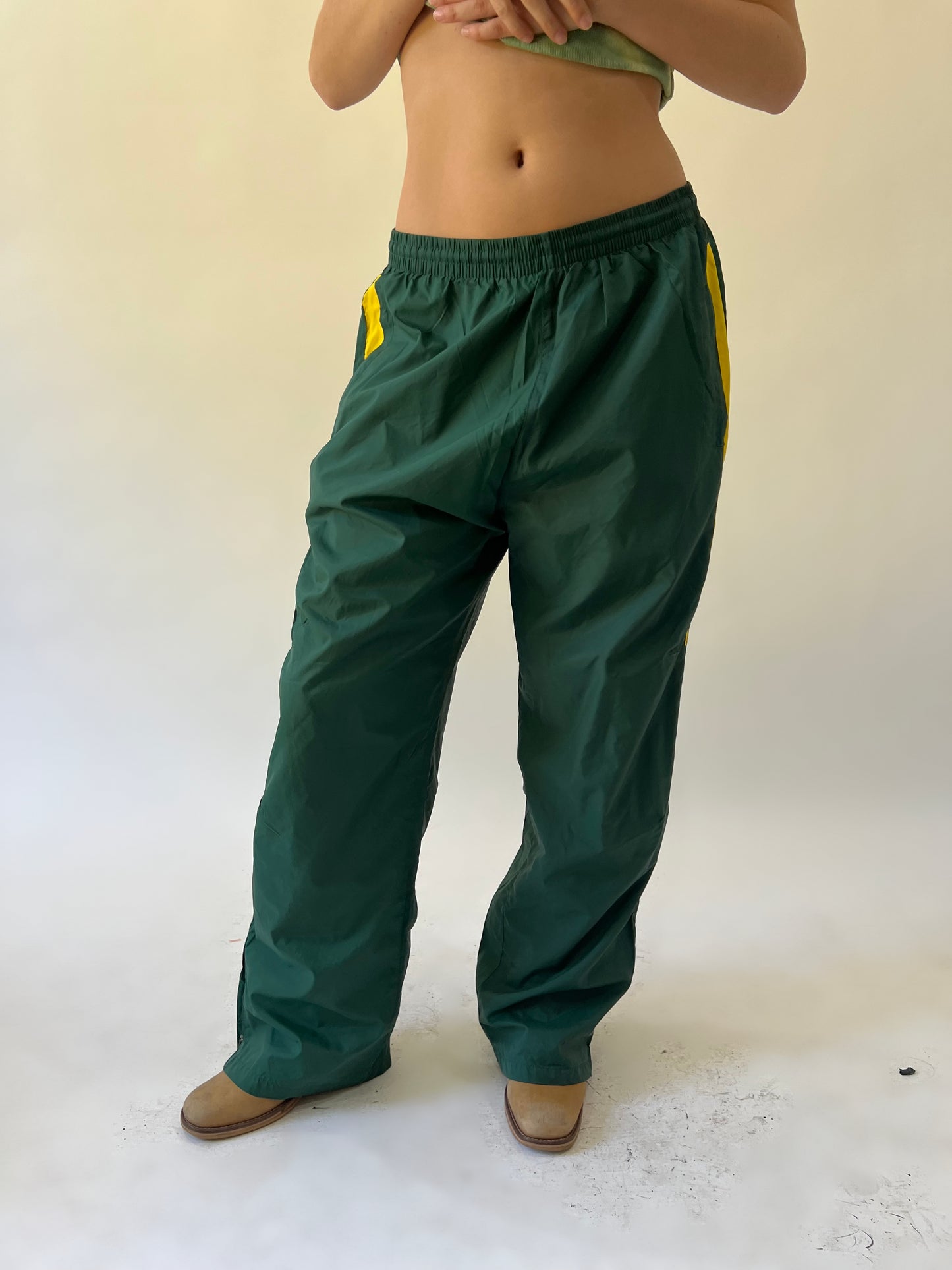back to school drop green and yellow track trousers front