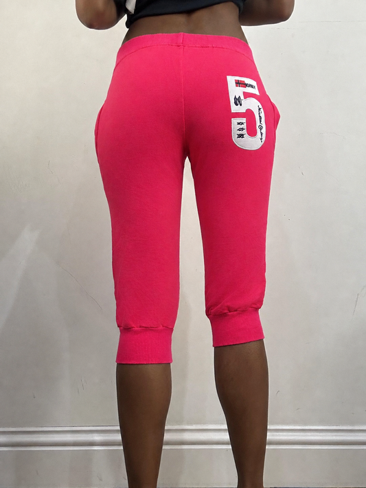 Hot pink cropped joggers, steamed, back view