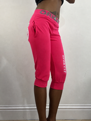 Hot pink cropped joggers, steamed, side view