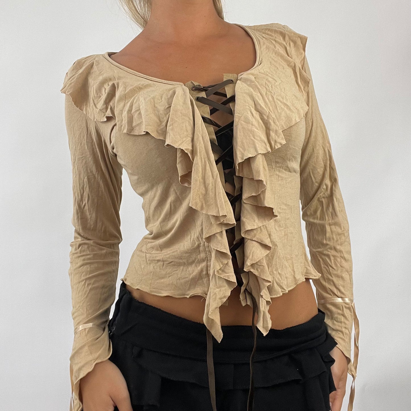 💚 💻 BOHO GIRL DROP | small light brown beige long sleeved top with brown lace up front and ruffle details