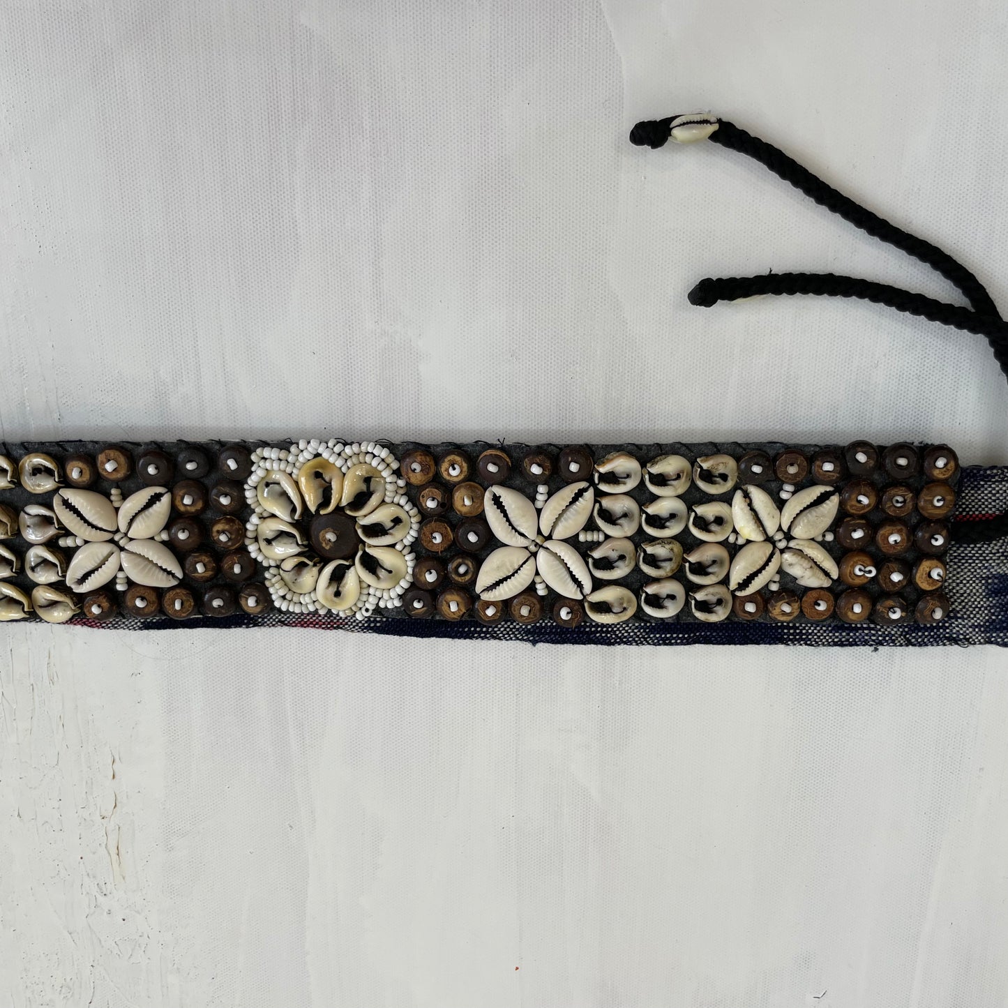 TROPICAL GIRL DROP | brown shell belt #1 – remass