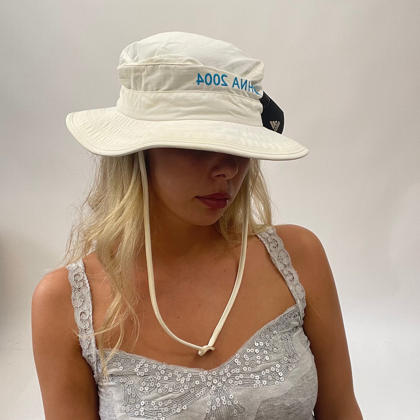 BOAT PARTY DROP | cream adidas sun hat with “aohna 2004” graphic