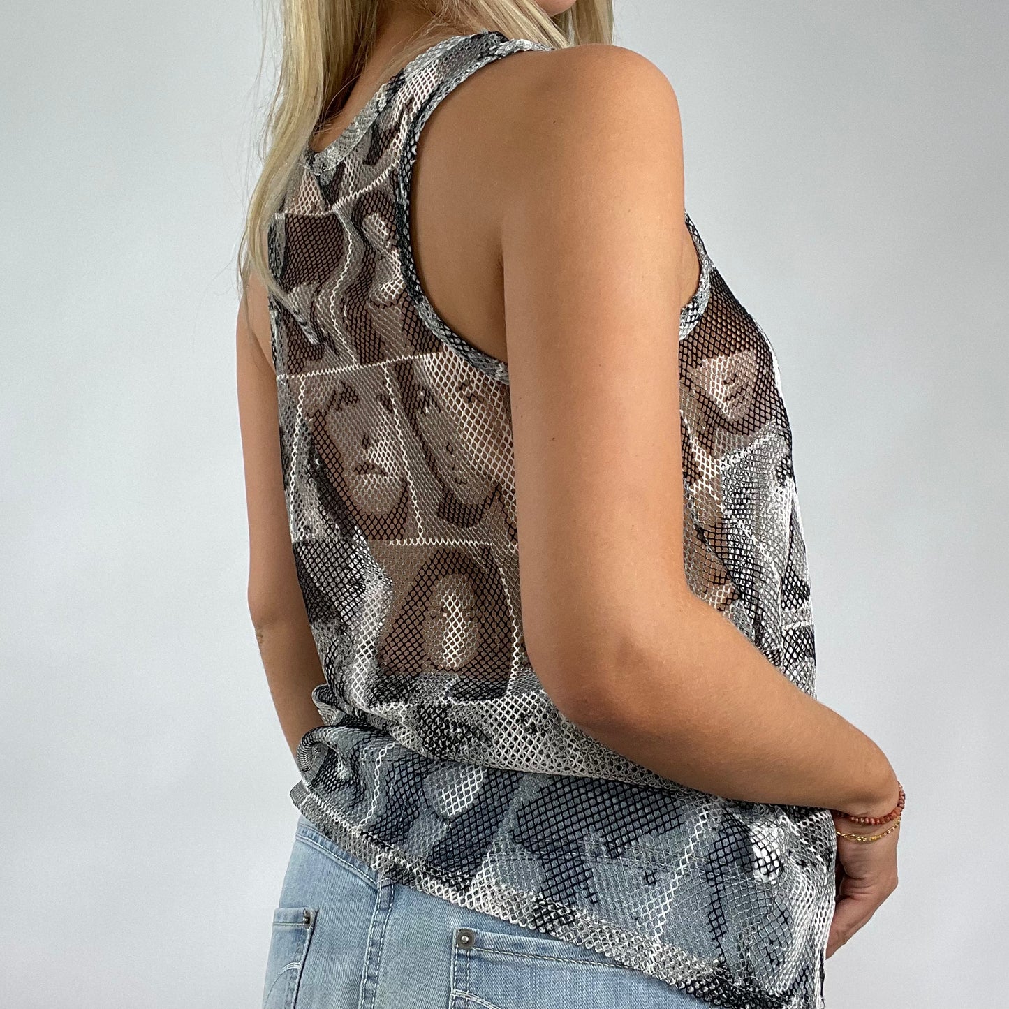 DROP 5 | medium fishbone fishnet face print vest