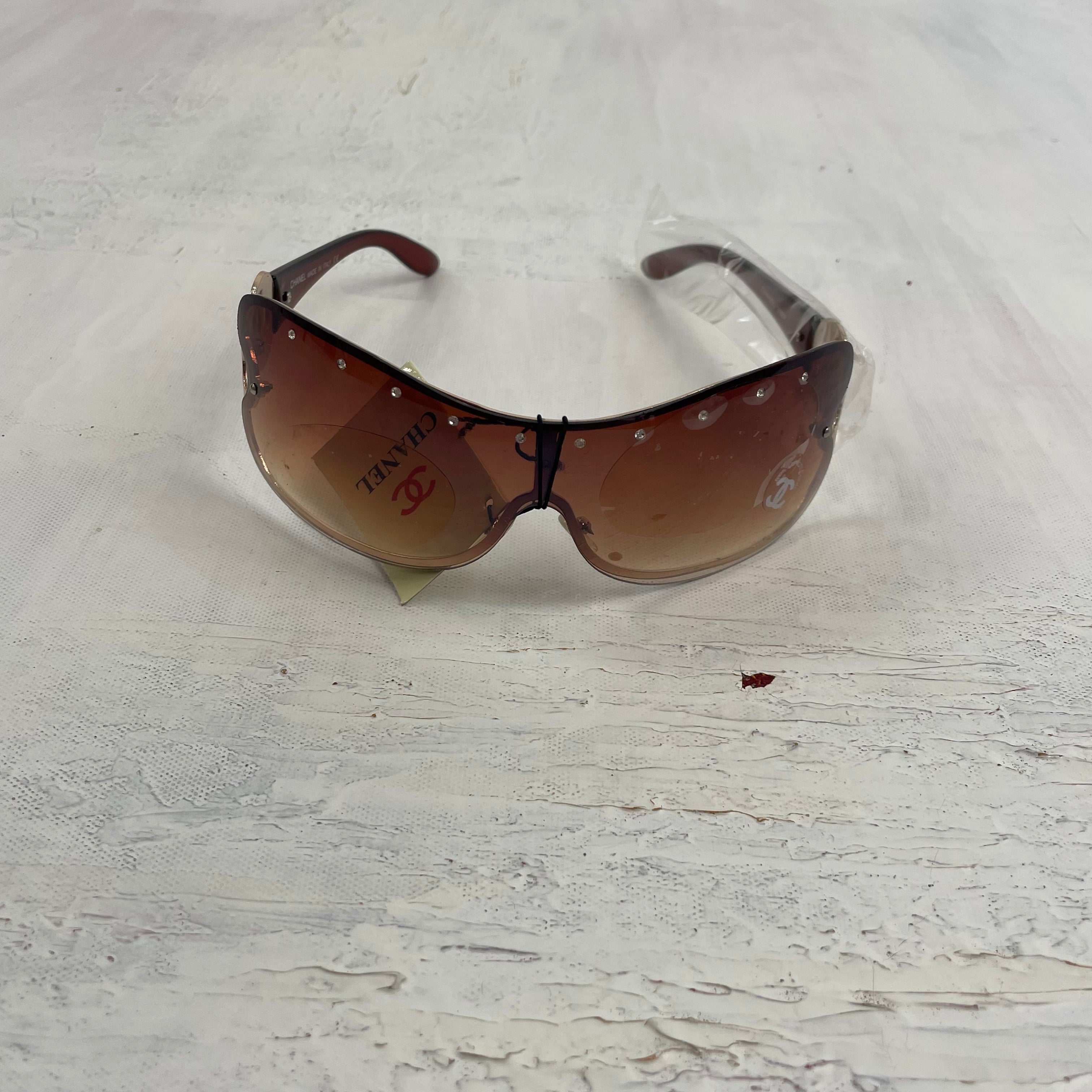 Chanel sunglasses brown top
