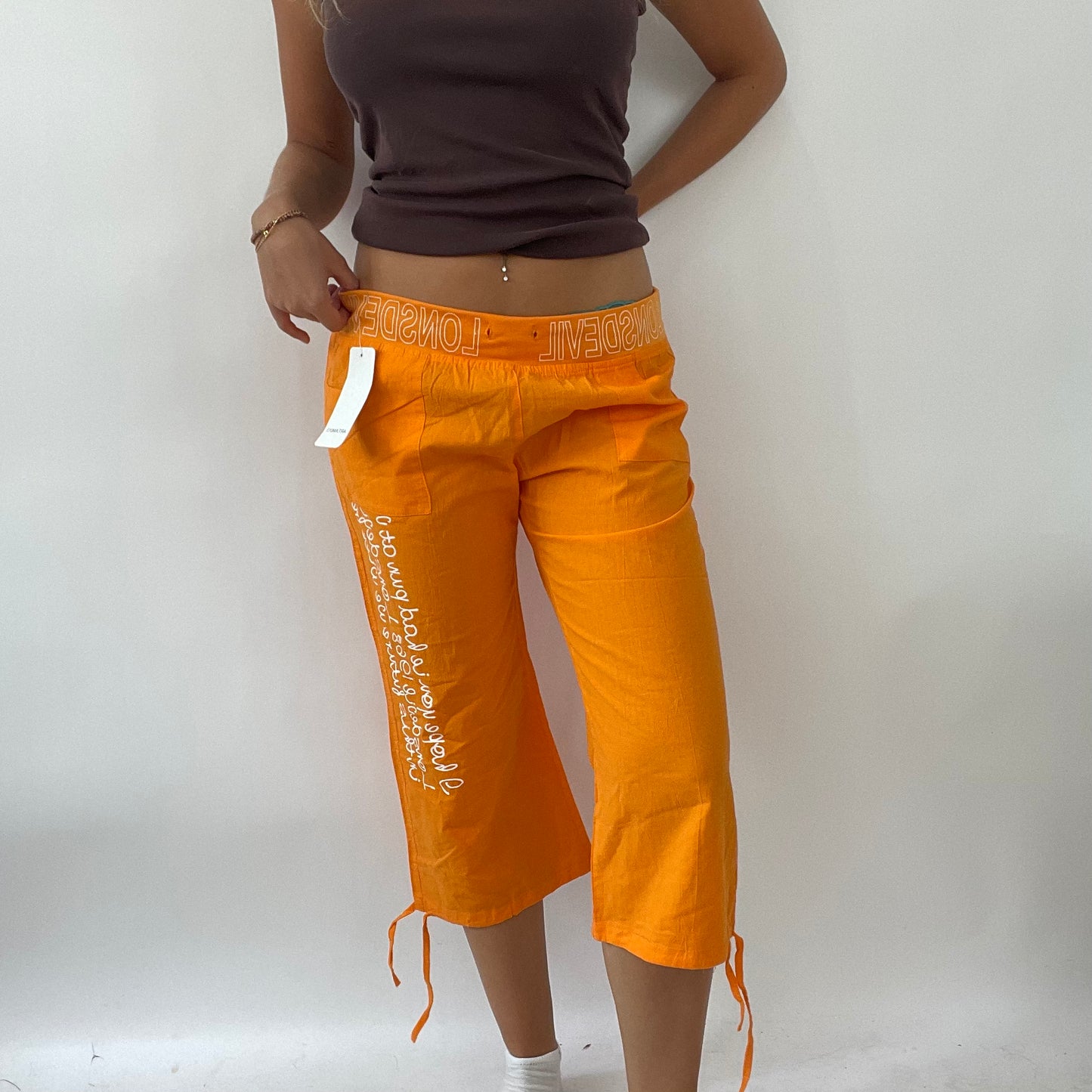 💻 TROPICAL GIRL DROP | large orange 3/4 length trousers with graphic print