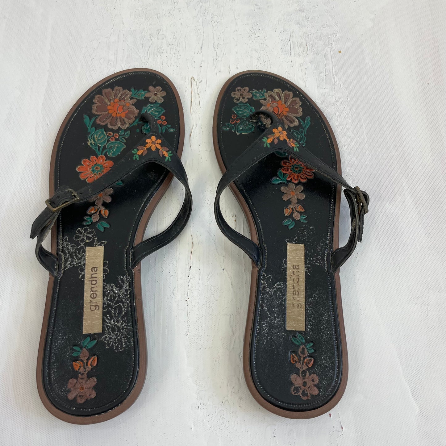 TROPICAL GIRL DROP | size 5 black buckle flip flops with floral multicoloured embroidered details