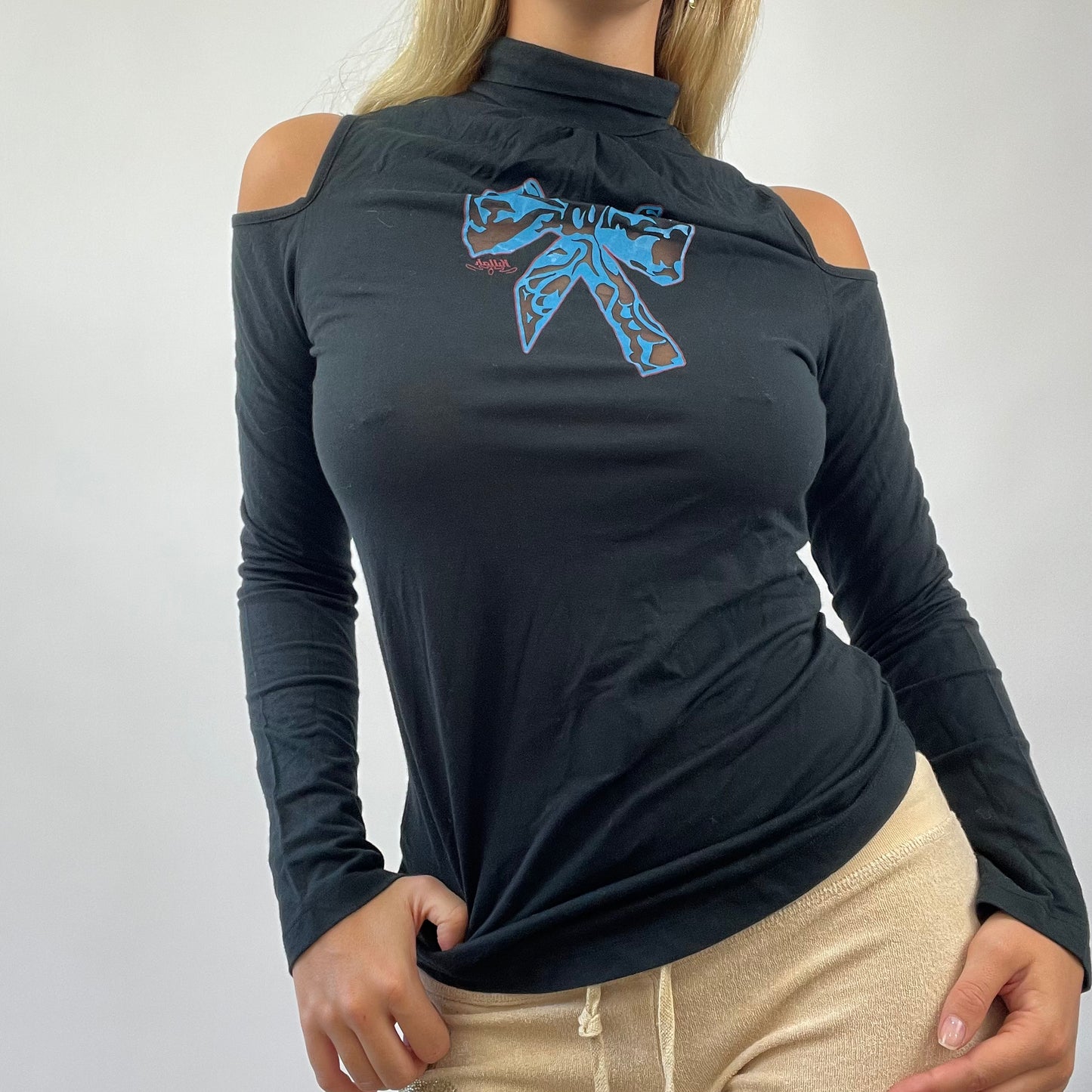 MISS REMASS DROP | small black long sleeve turtle neck top with bow graphic