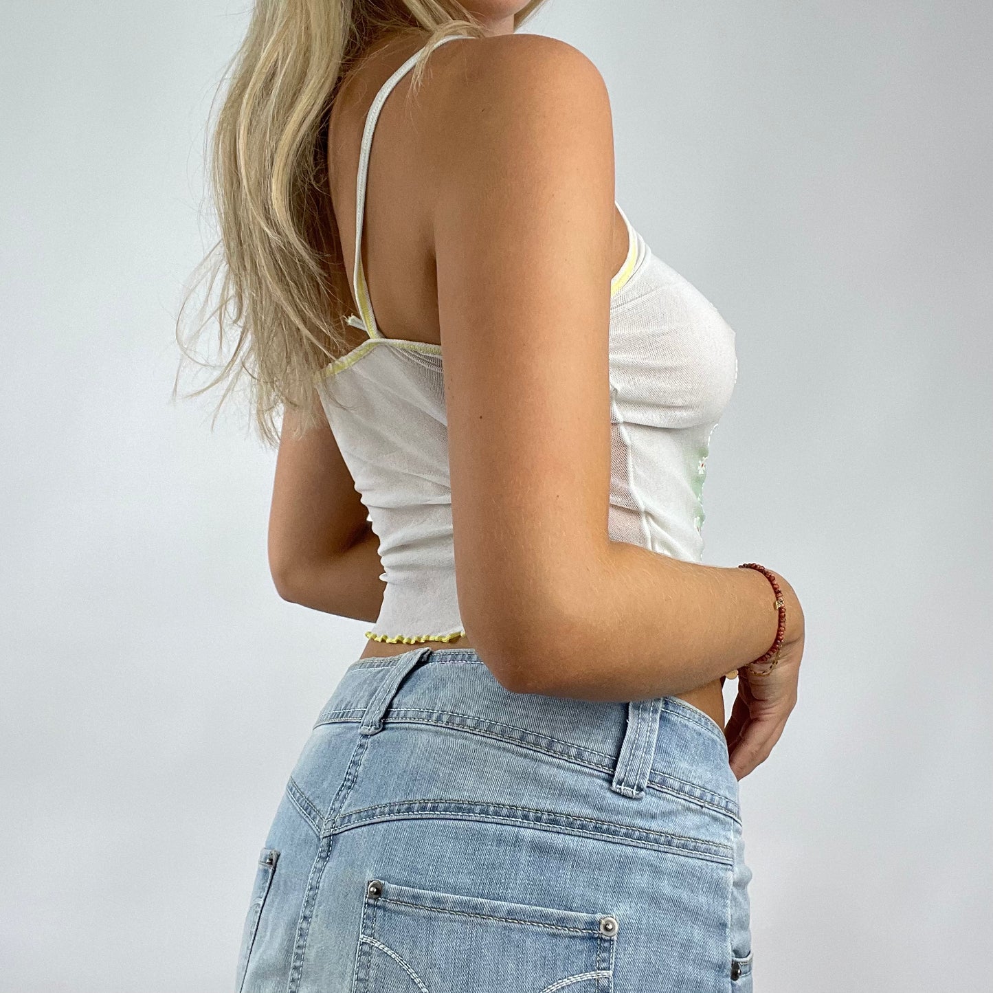 💻 DROP 5 | small white vest with daisy graphic and lettuce hem
