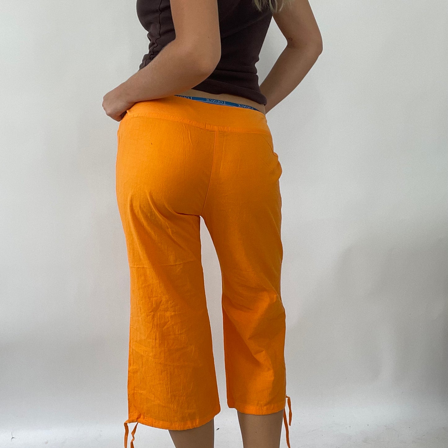 💻 TROPICAL GIRL DROP | large orange 3/4 length trousers with graphic print