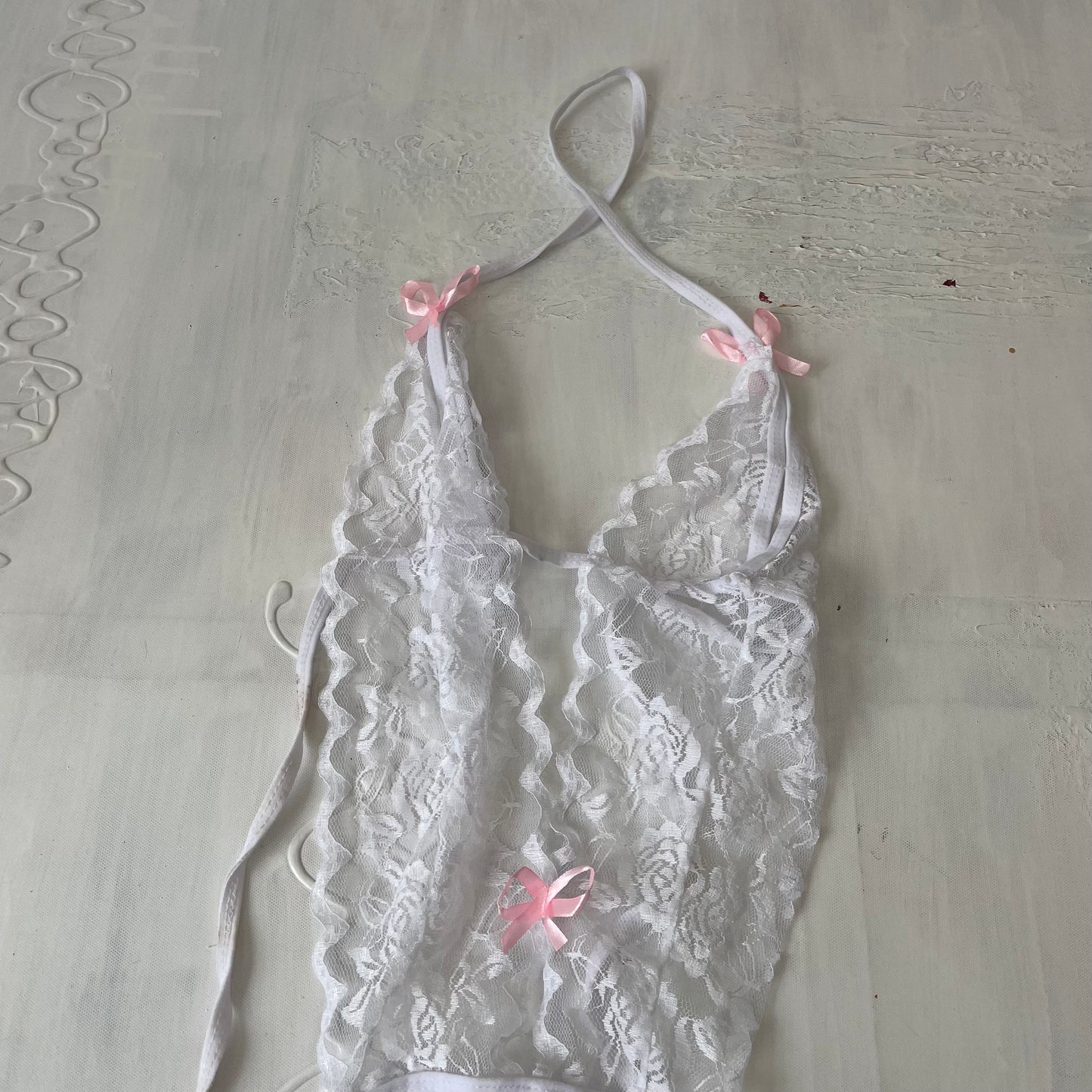 DAINTY DROP | white lace bodysuit with pink bows - small