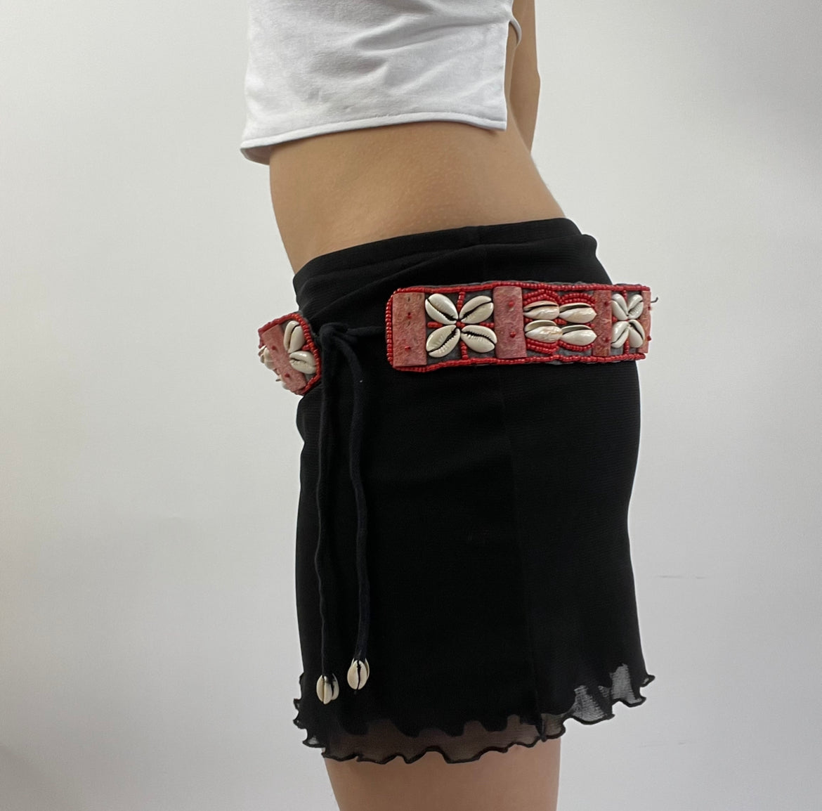 red and white shell belt