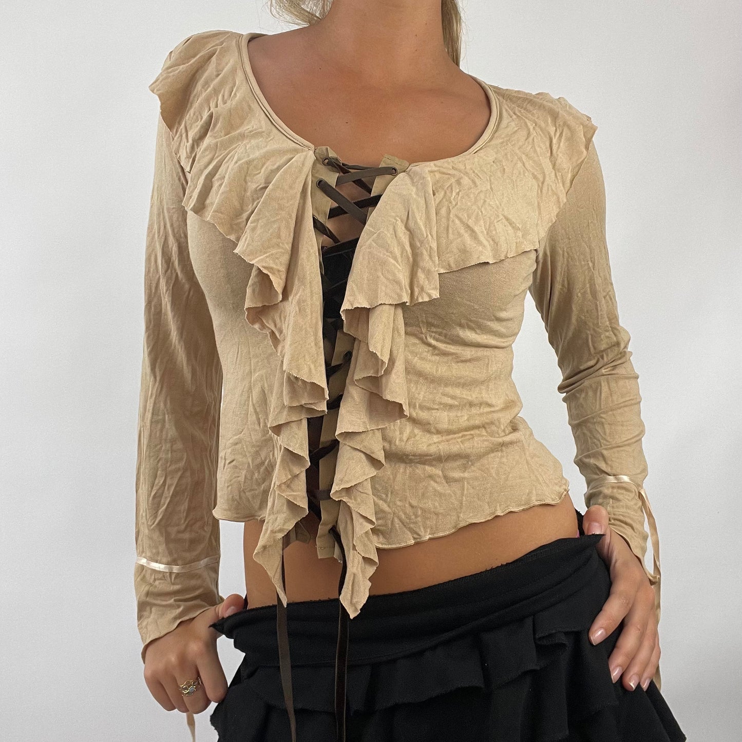 💚 💻 BOHO GIRL DROP | small light brown beige long sleeved top with brown lace up front and ruffle details
