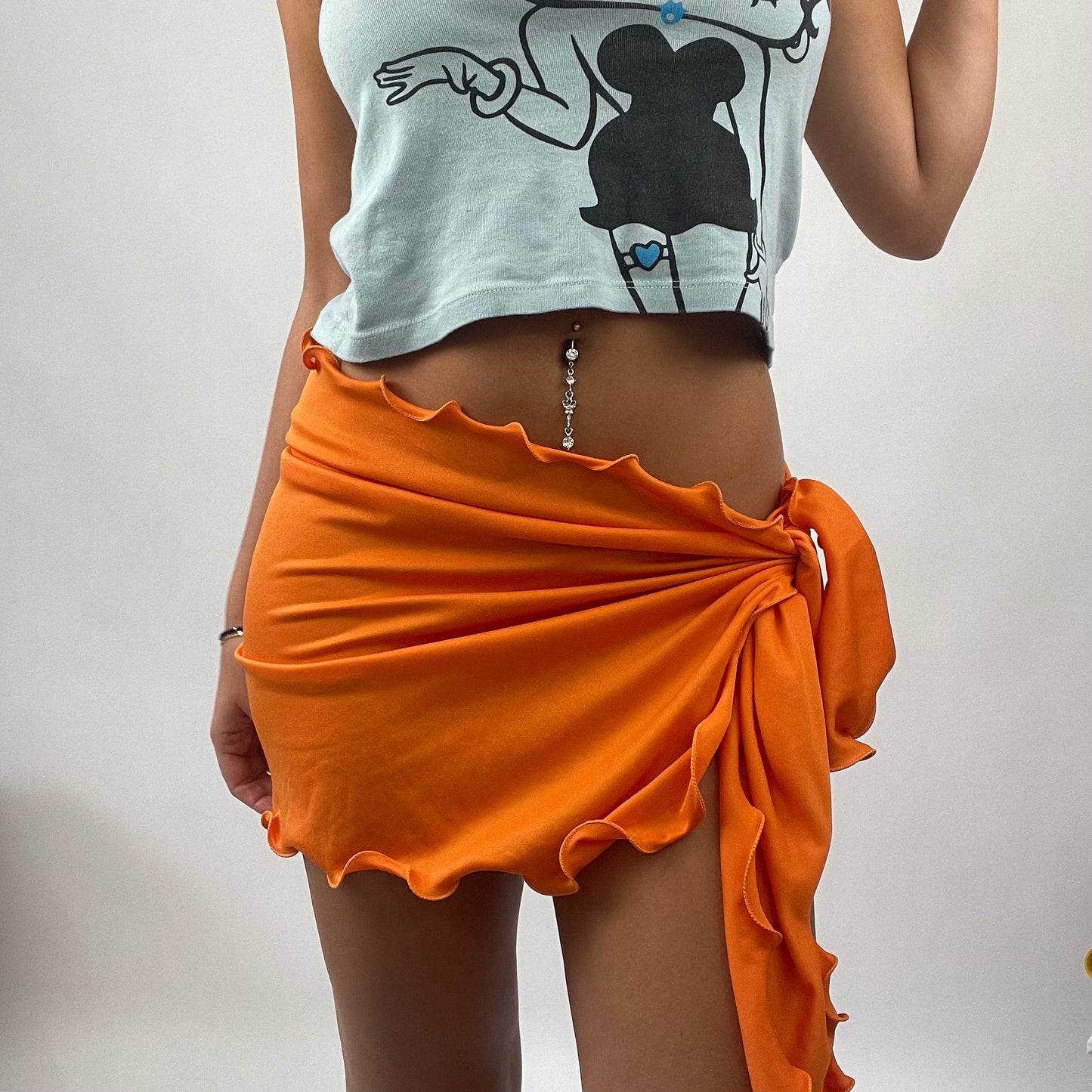 BOAT PARTY DROP | orange frill tie side skirt