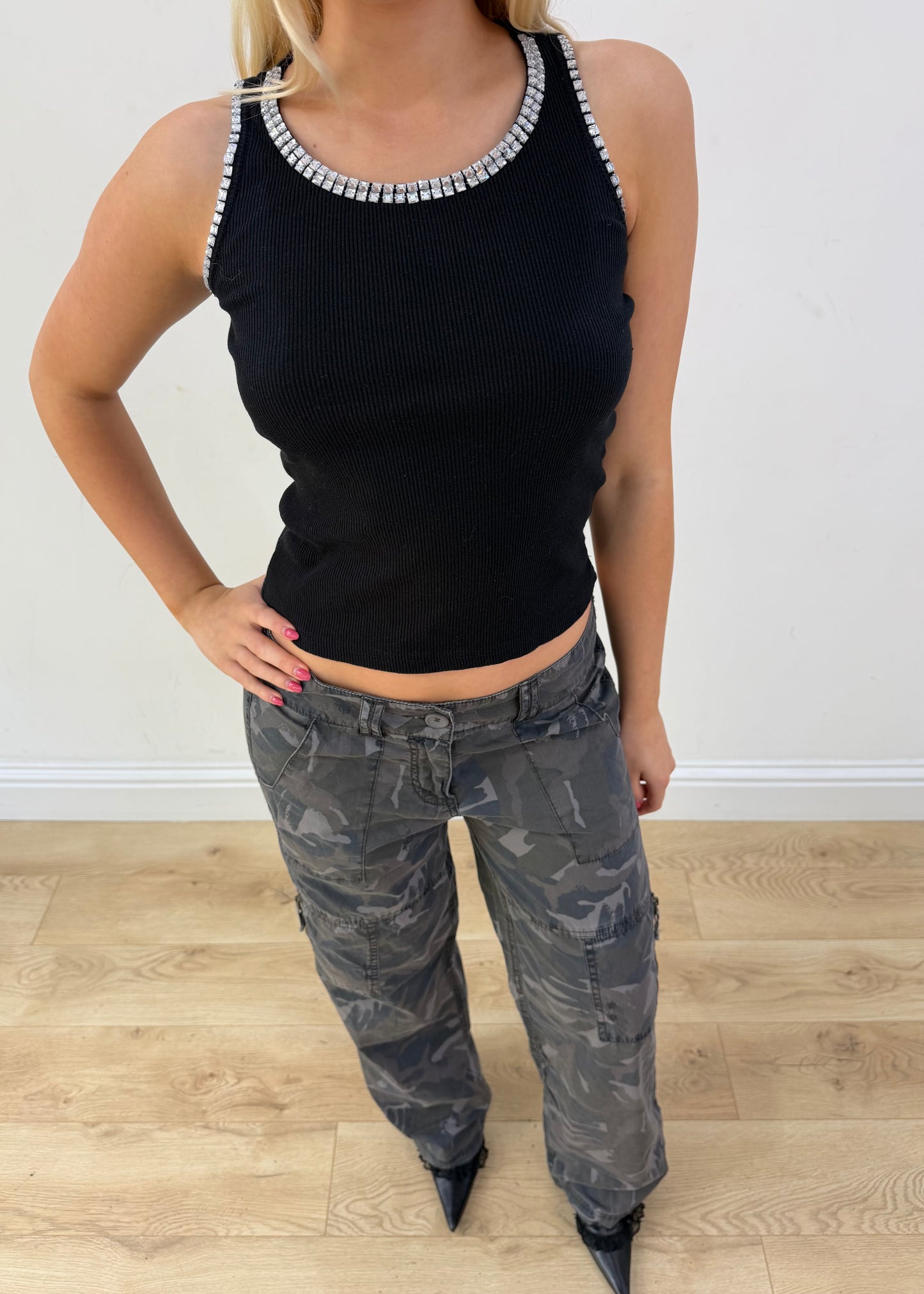small black tank top with rhinestone neckline