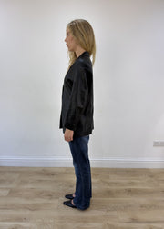 large black faux leather fitted jacket side view