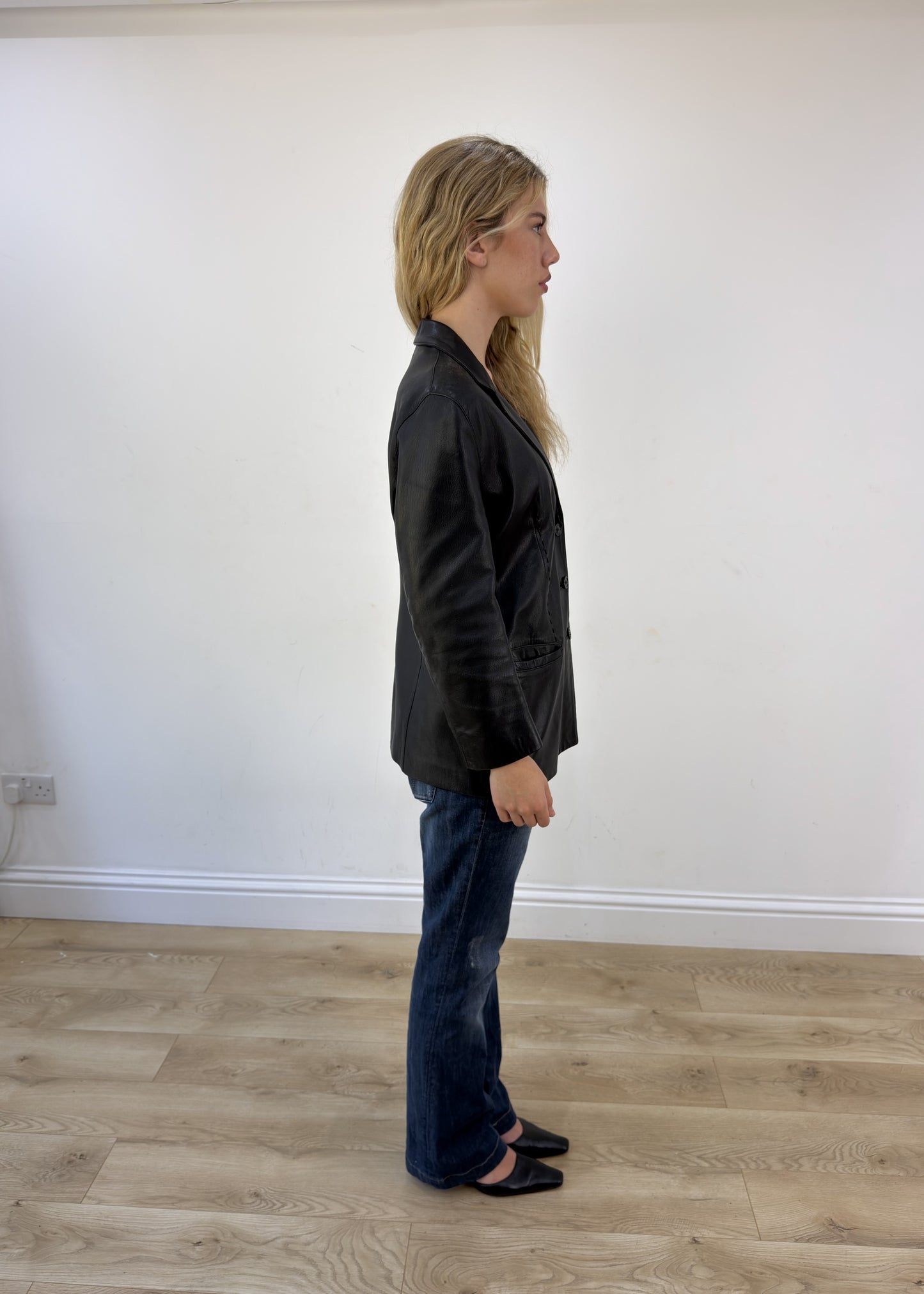 large black faux leather fitted jacket other side view