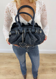navy blue leather shoulder bag with heart charms 3