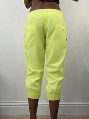 Neon green cropped joggers, steamed, back view