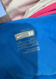 small blue nike zip up playsuit