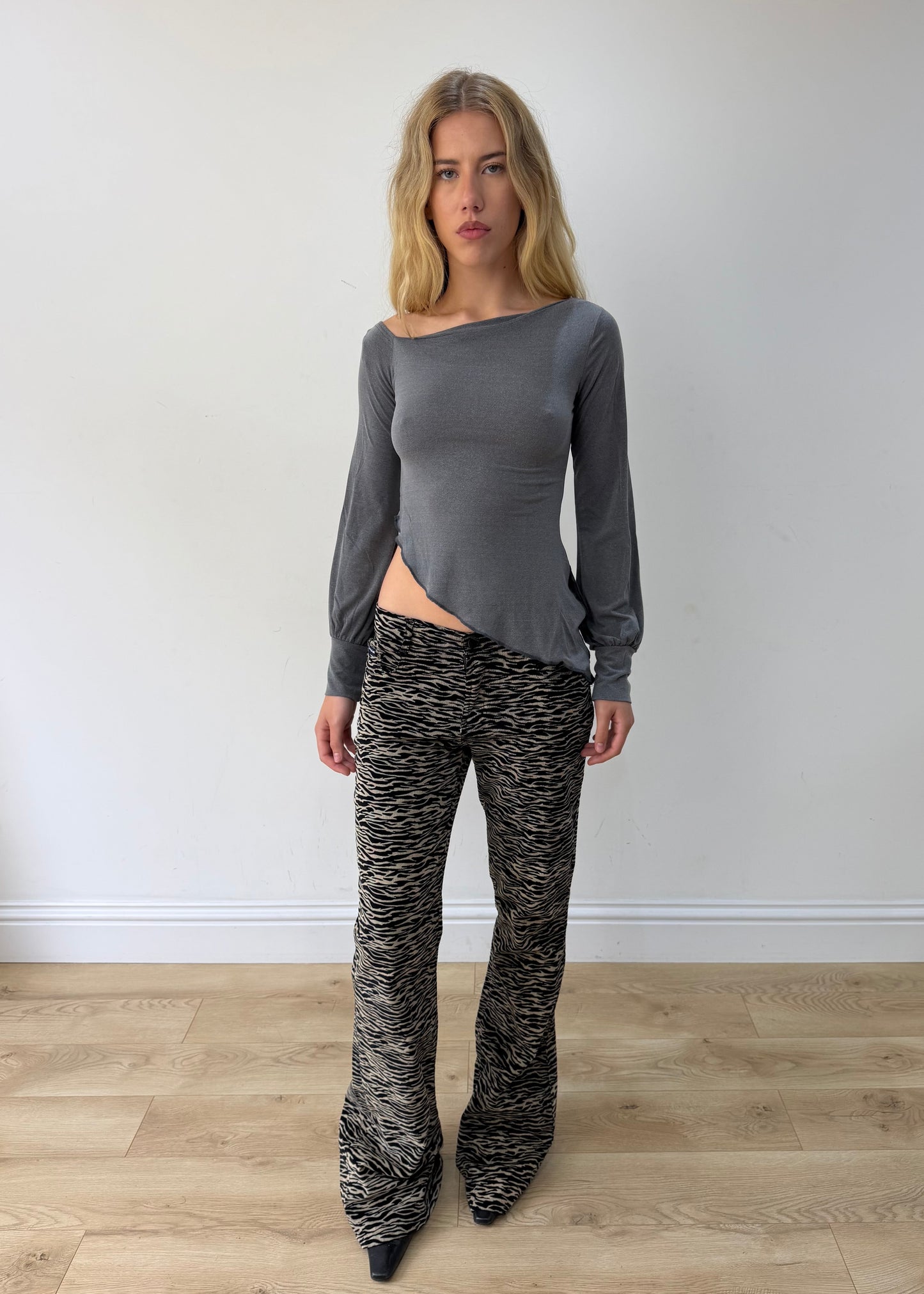 small grey asymmetric one-shoulder long-sleeve top — photographed on Lily
