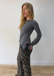 small grey asymmetric one-shoulder long-sleeve top — photographed on Lily