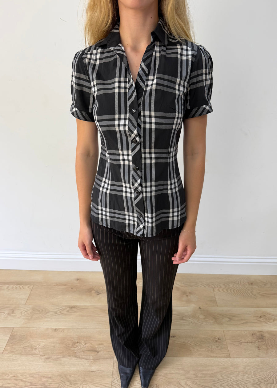 medium black and white plaid short-sleeve fitted shirt — photographed on Lily