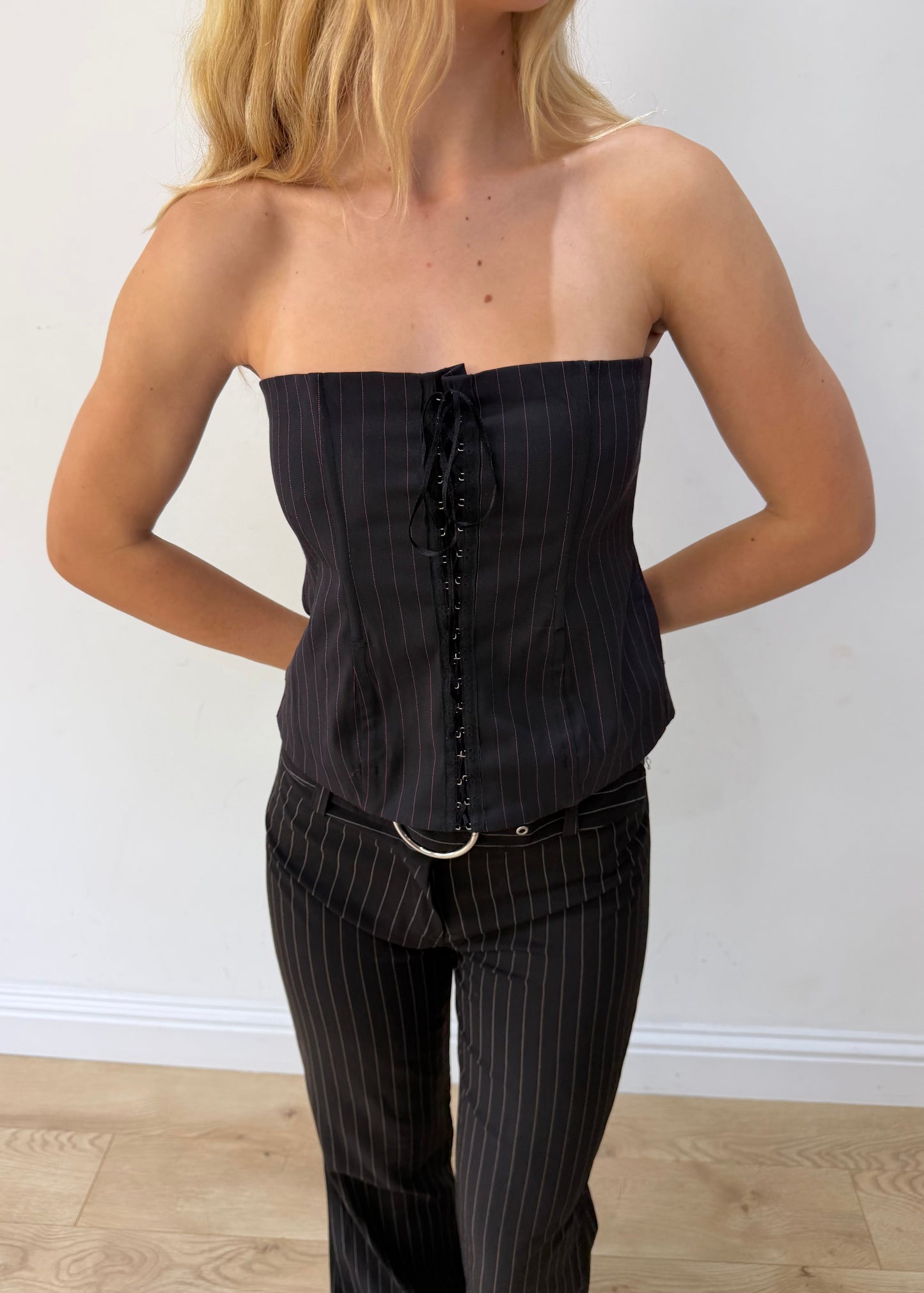 medium black pinstripe lace-up corset top — photographed on Lily