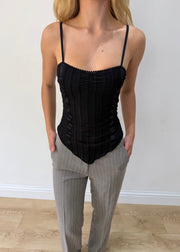 small black spaghetti-strap top — photographed on Lily