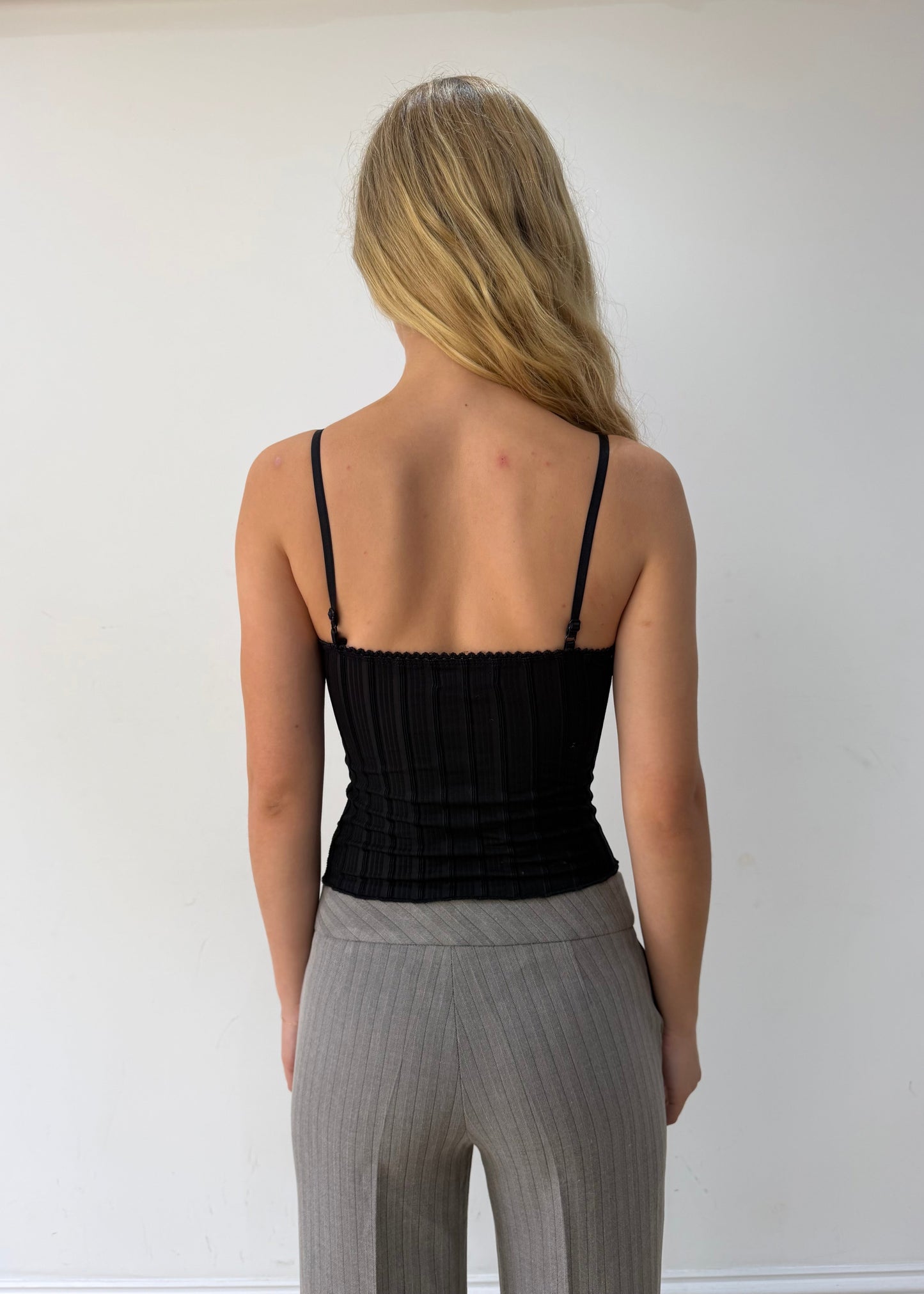 small black spaghetti-strap top — photographed on Lily