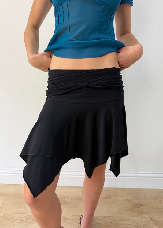 small black asymmetric handkerchief-hem skirt — photographed on Lily