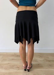 small black asymmetric handkerchief-hem skirt — photographed on Lily