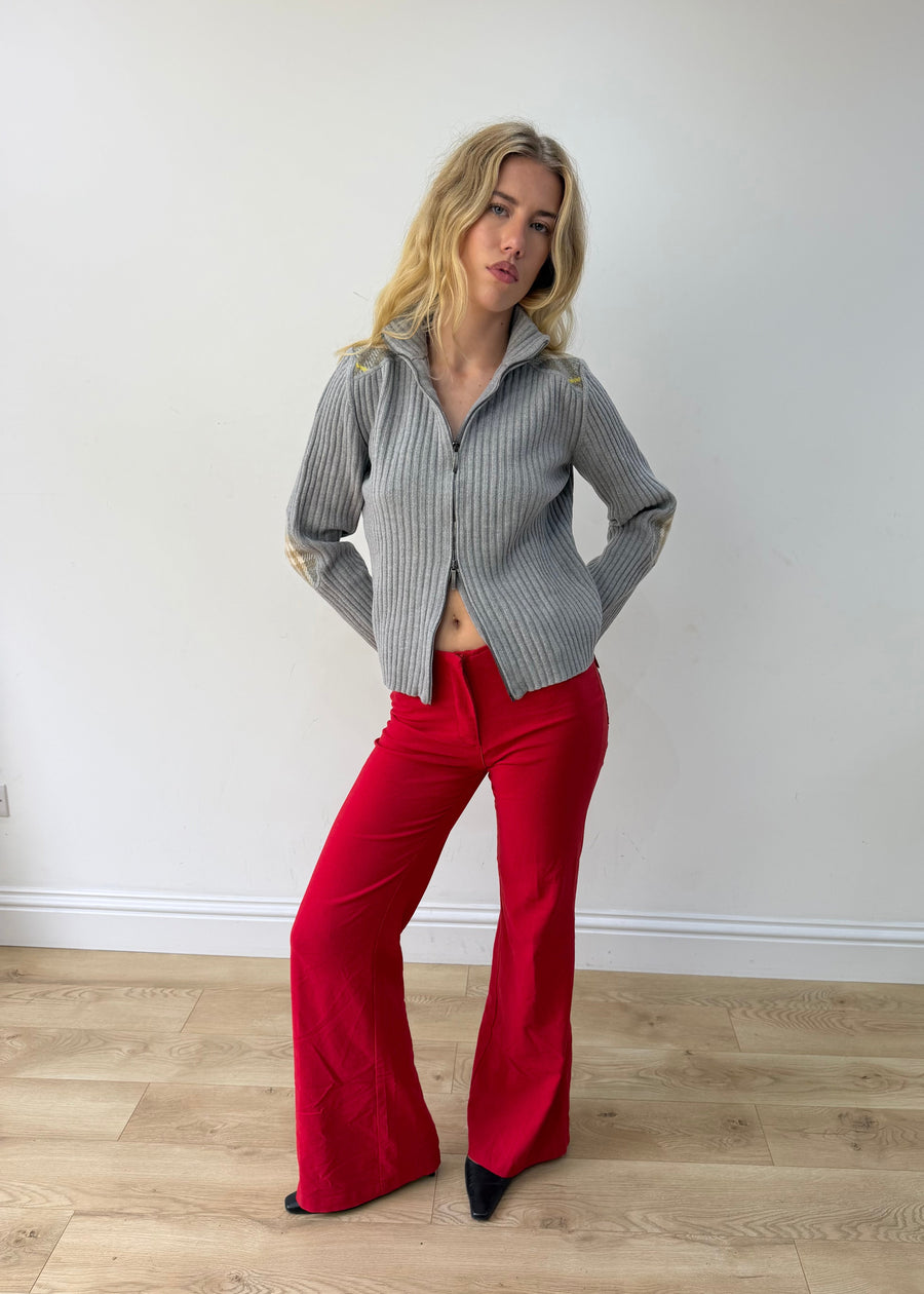 small red flap-pocket flared trousers — photographed on Lily