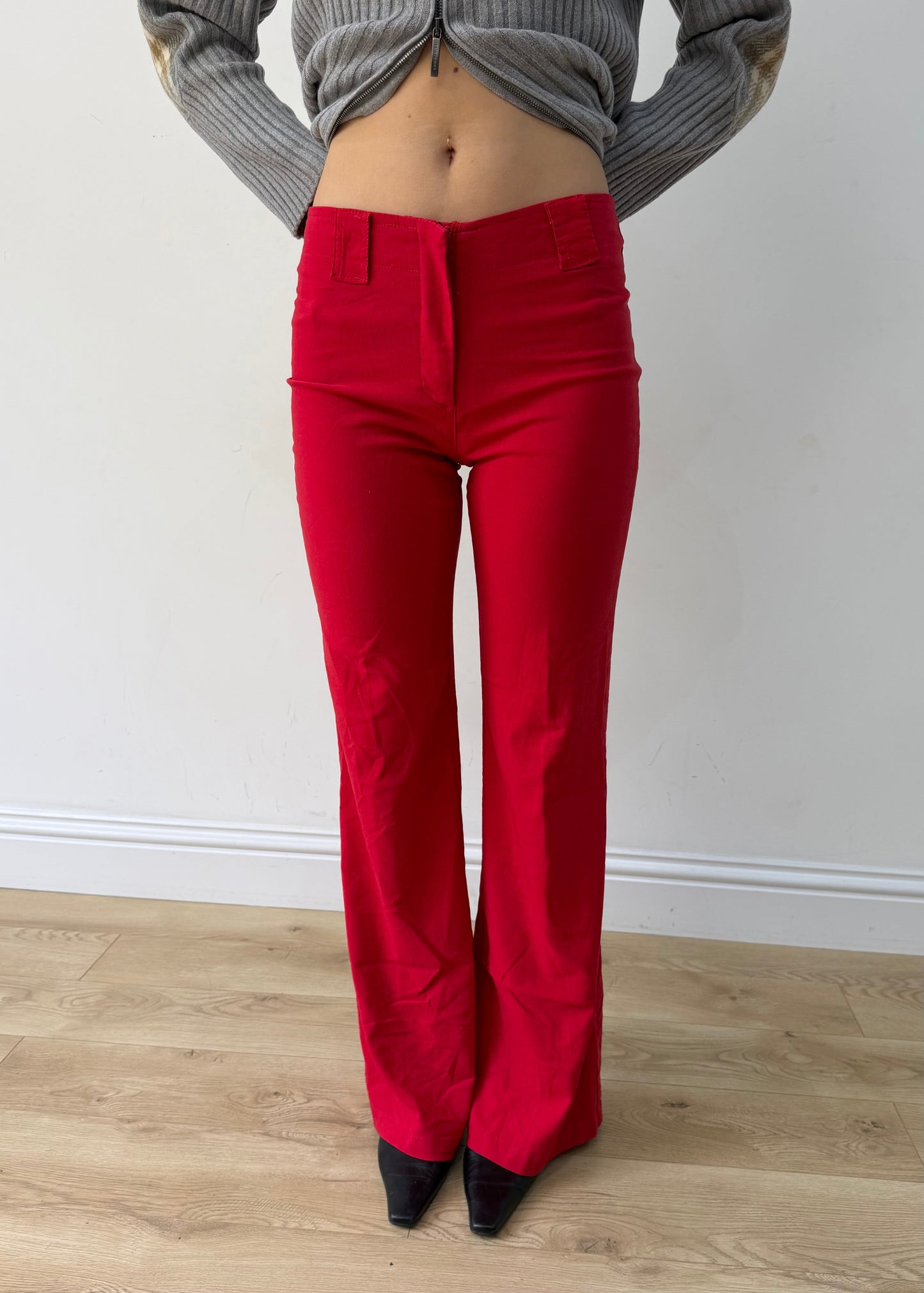 small red flap-pocket flared trousers — photographed on Lily